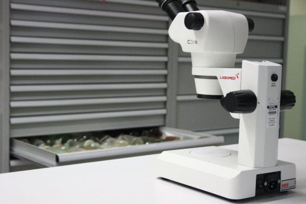 Microscope bench in front of Boscotek cabinets