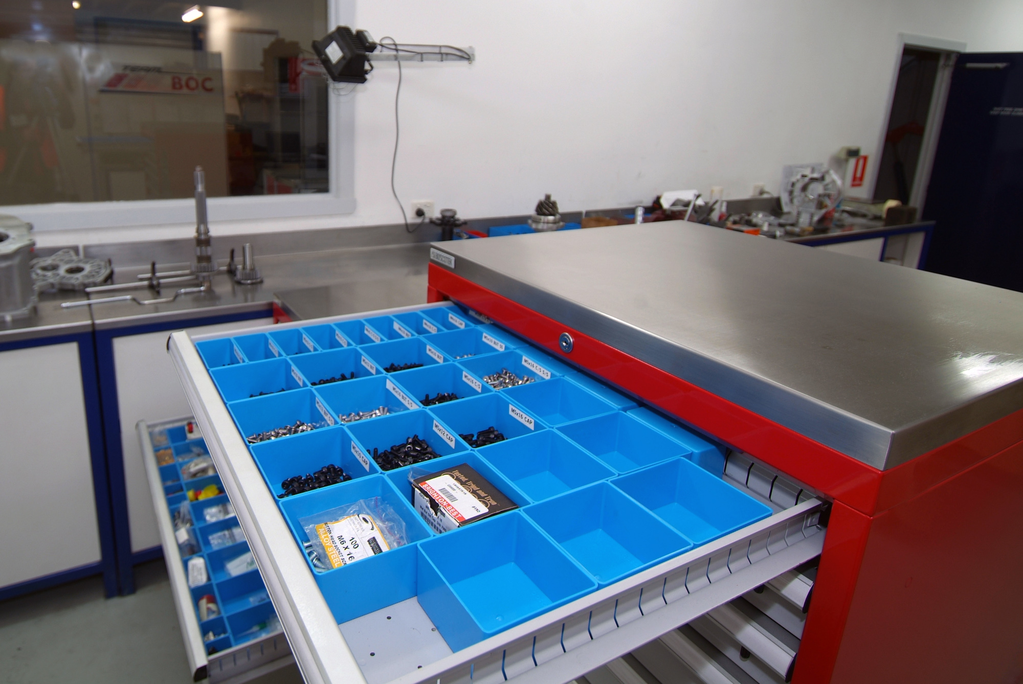 Boscotek high density storage cabinet with blue bins, organised for efficient tool management.