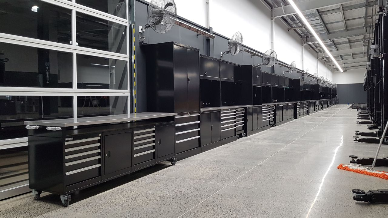 Boscotek industrial workbenches and storage cabinets in a modern workshop fitout