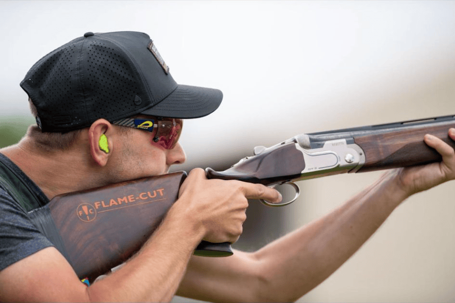 Josh Bell aiming rifle during training supported by OPIE Manufacturing Group for Paris Games 2024