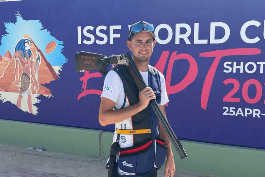 Josh Bell preparing with shooting gear supported by OPIE Manufacturing Group for Paris Games 2024