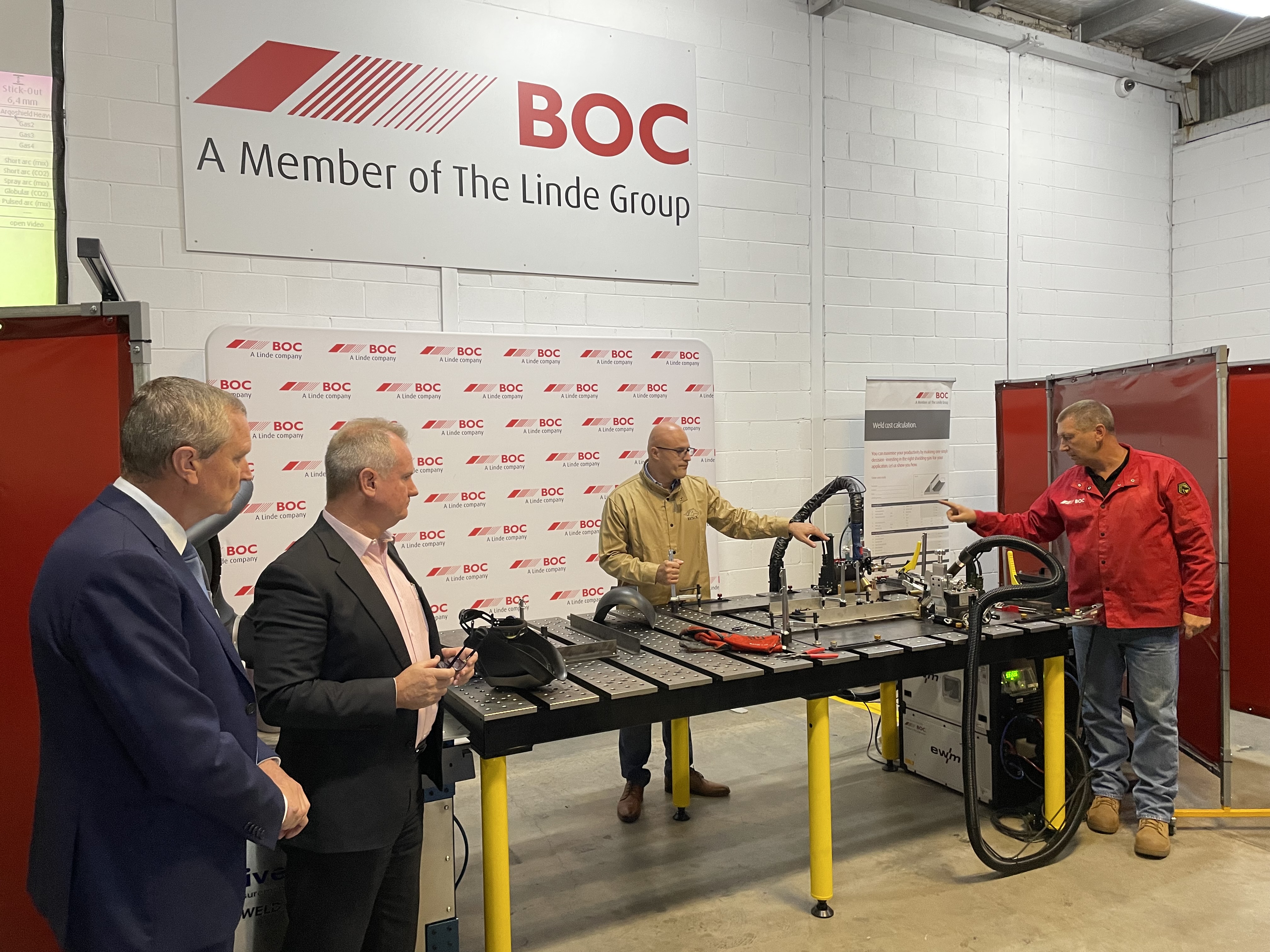 Wilson & Gilkes welding demonstration beside precision sheet metal fabrication equipment